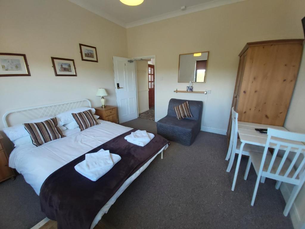 Postel nebo postele na pokoji v ubytování Sergeants Accommodation