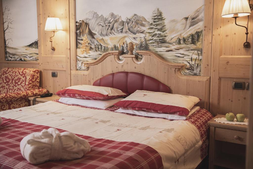 Postel nebo postele na pokoji v ubytování Hotel Rubino Deluxe
