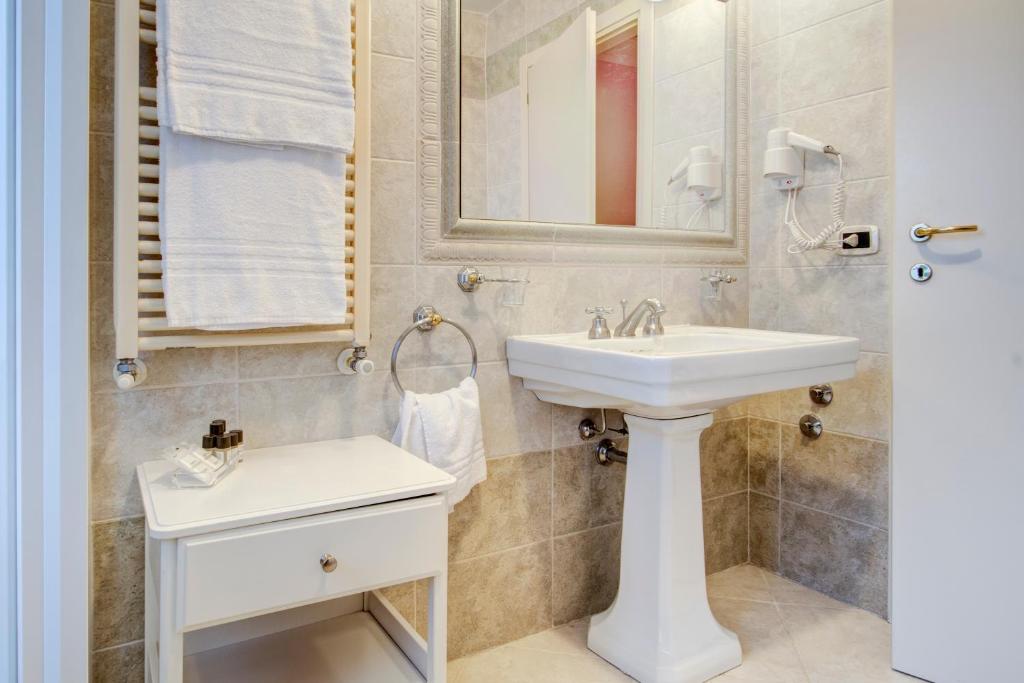 Koupelna v ubytování Hotel La Locanda