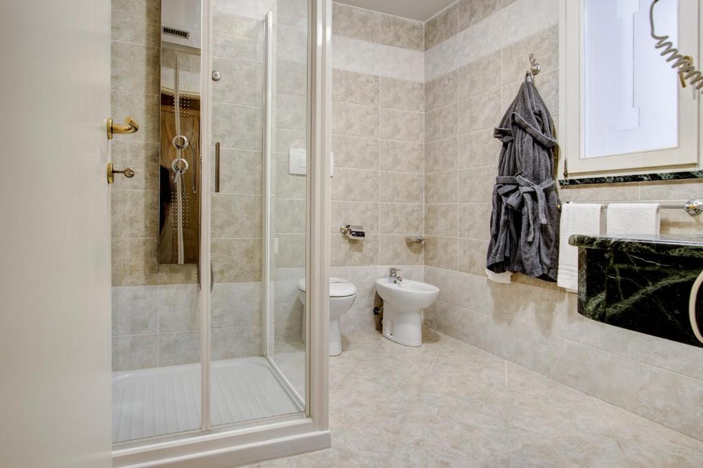 Koupelna v ubytování Hotel La Locanda