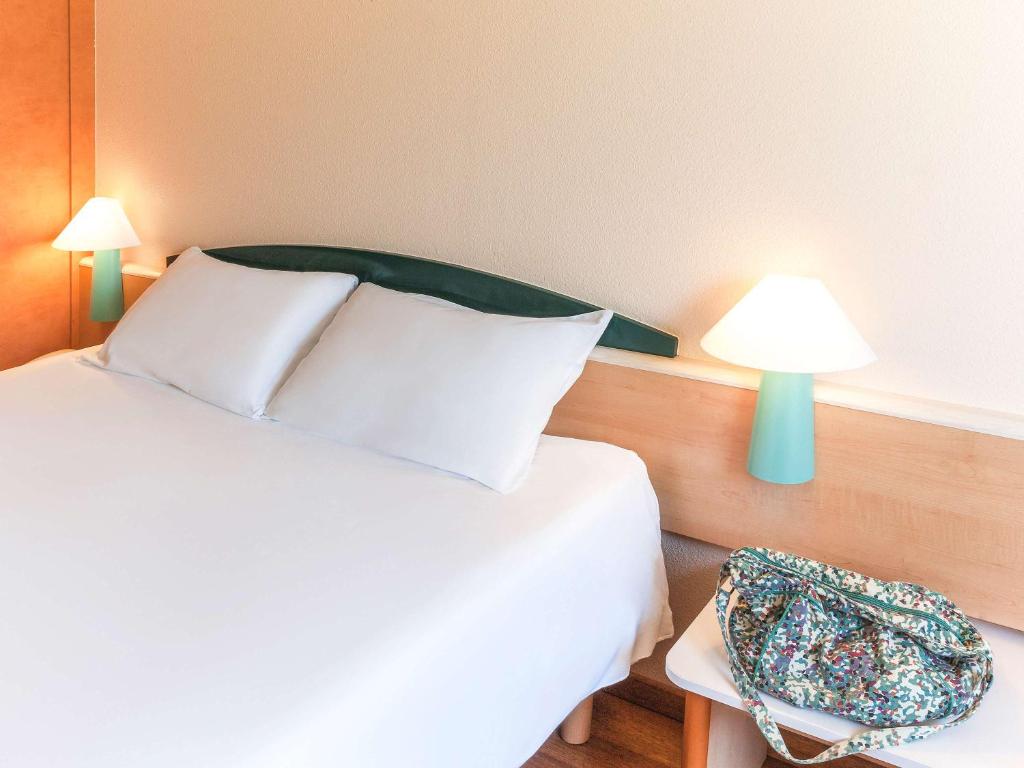 Postel nebo postele na pokoji v ubytování Ibis Murcia