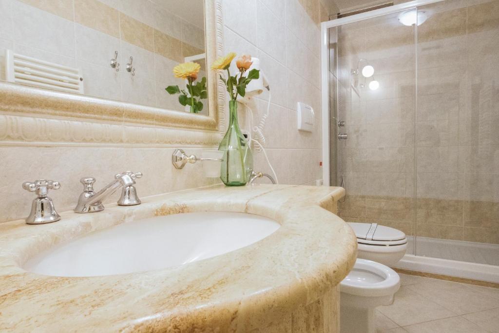 Koupelna v ubytování Hotel La Locanda