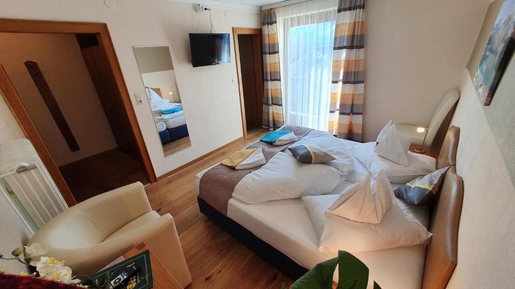 Postel nebo postele na pokoji v ubytování Gästehaus Bärwald