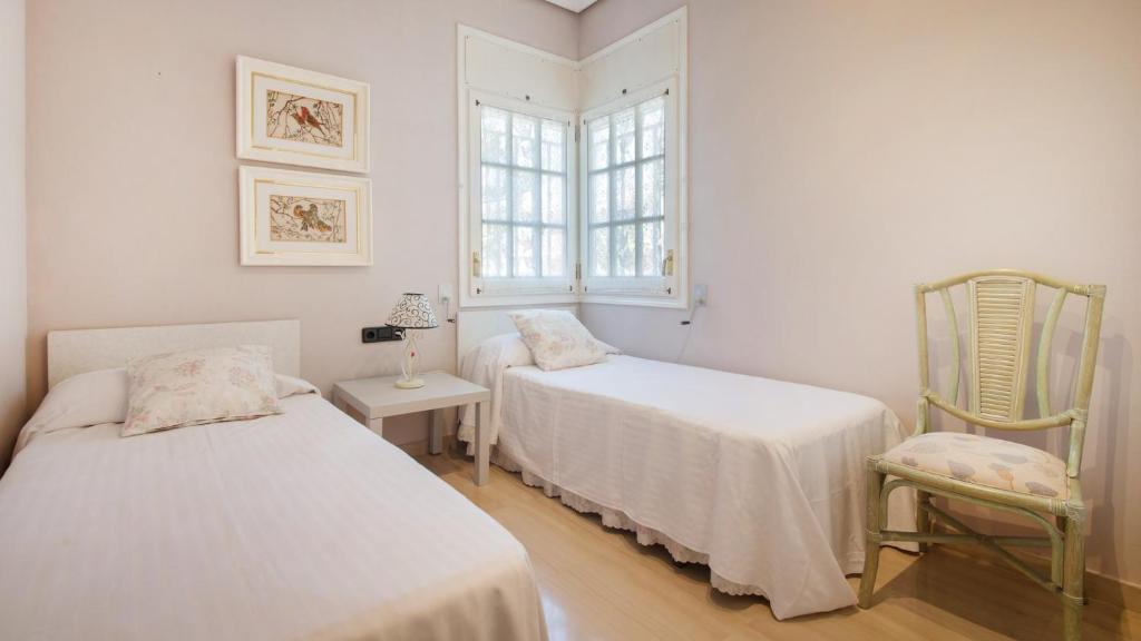 A bed or beds in a room at R60 Casa Sendo