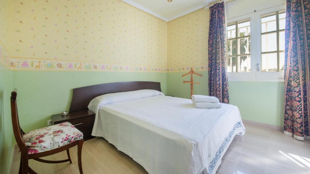 A bed or beds in a room at R60 Casa Sendo