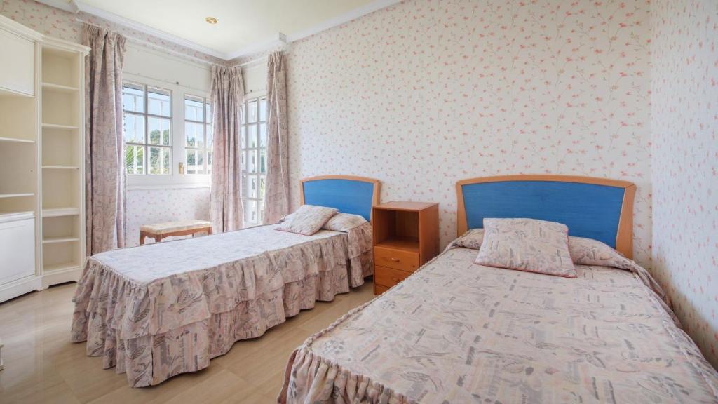 A bed or beds in a room at R60 Casa Sendo