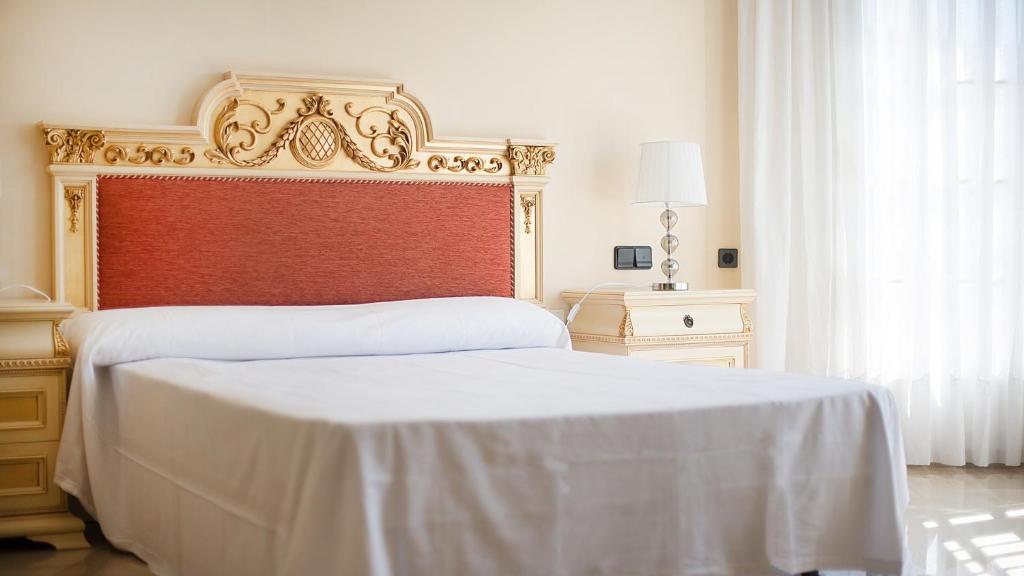 A bed or beds in a room at R60 Casa Sendo
