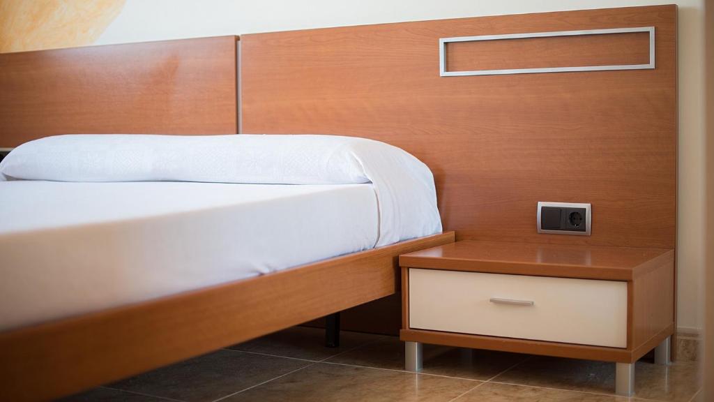 Postel nebo postele na pokoji v ubytování R34 Ático RAMBLA