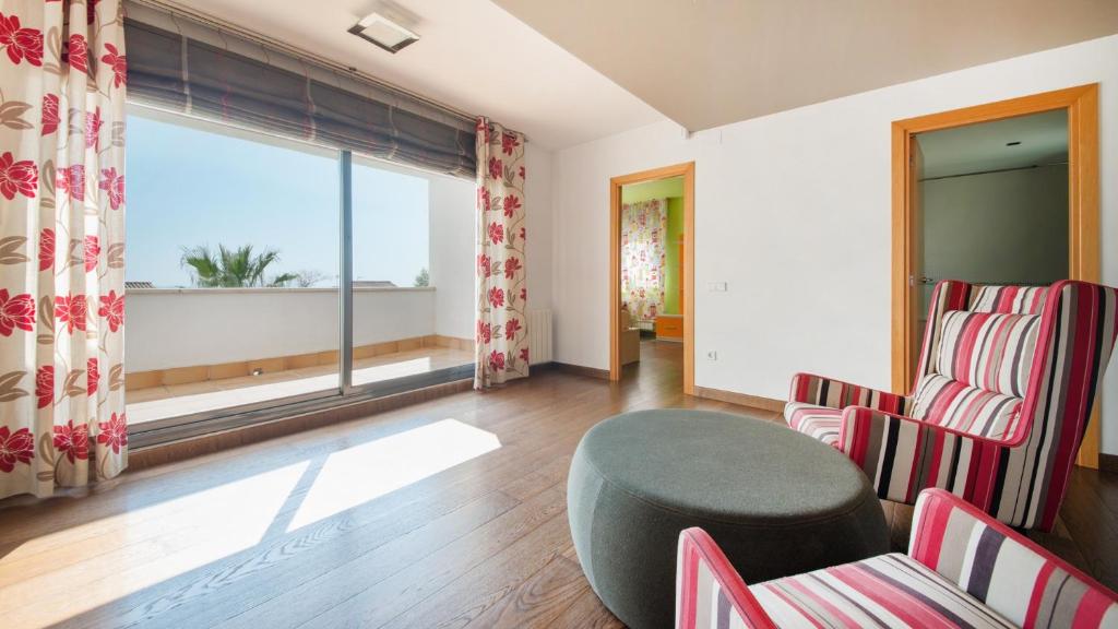 Posedenie v ubytovaní R64 Deluxe Villa Déjà Vu