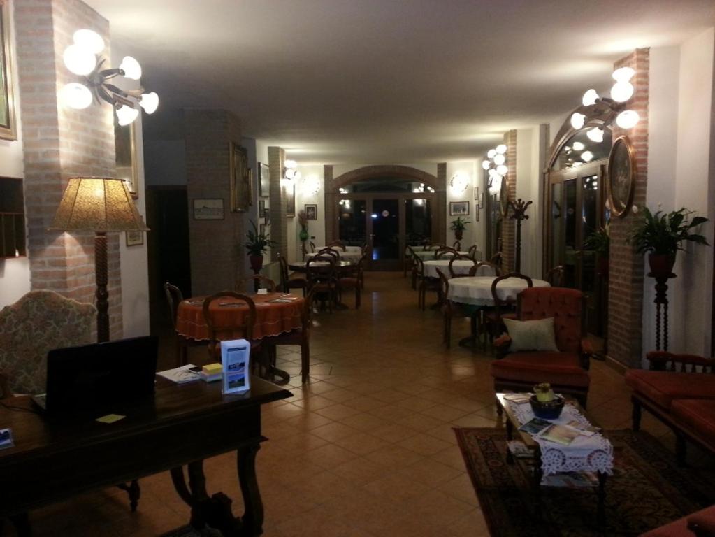 Reštaurácia alebo iné gastronomické zariadenie v ubytovaní Agriturismo Corte Trincerone