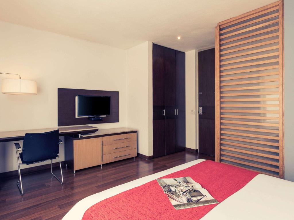 TV a/nebo společenská místnost v ubytování Mercure Bogota BH Retiro