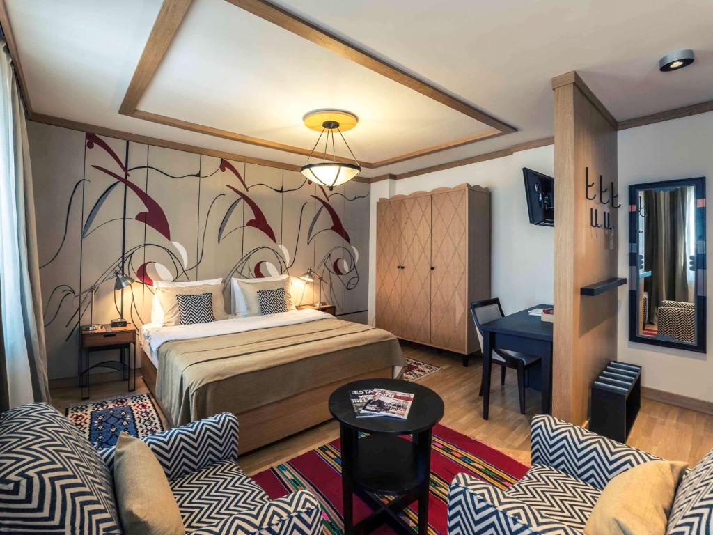 Postel nebo postele na pokoji v ubytování Mercure Belgrade Excelsior