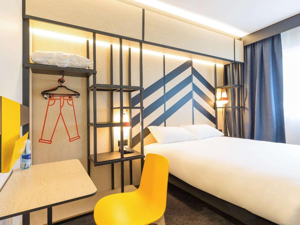 Postel nebo postele na pokoji v ubytování ibis Styles Geneve Palexpo Aeroport