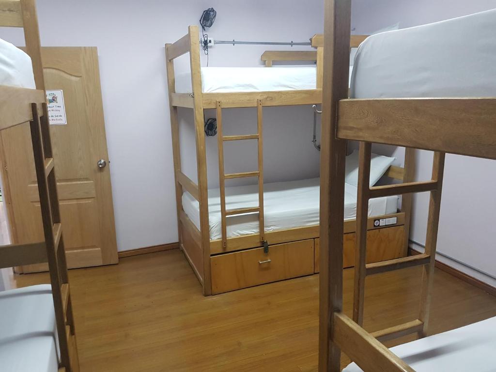 Cama o camas de una habitación en Purple Monkey Hostel