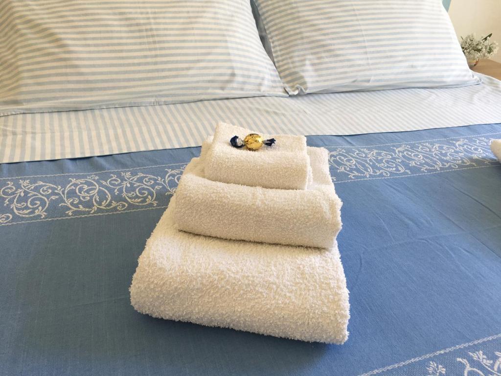 Postel nebo postele na pokoji v ubytování Hotel Villa Rinaldini