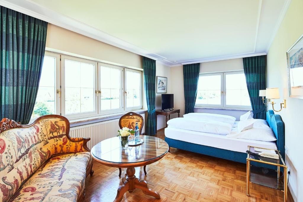 Postel nebo postele na pokoji v ubytování Reck's Hotel-Restaurant