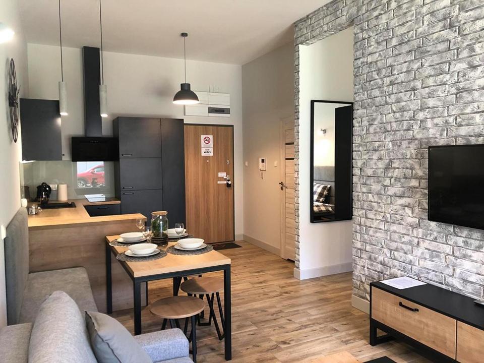 Kuchyň nebo kuchyňský kout v ubytování Property Apart - Soft Lofty Legnicka Centrum