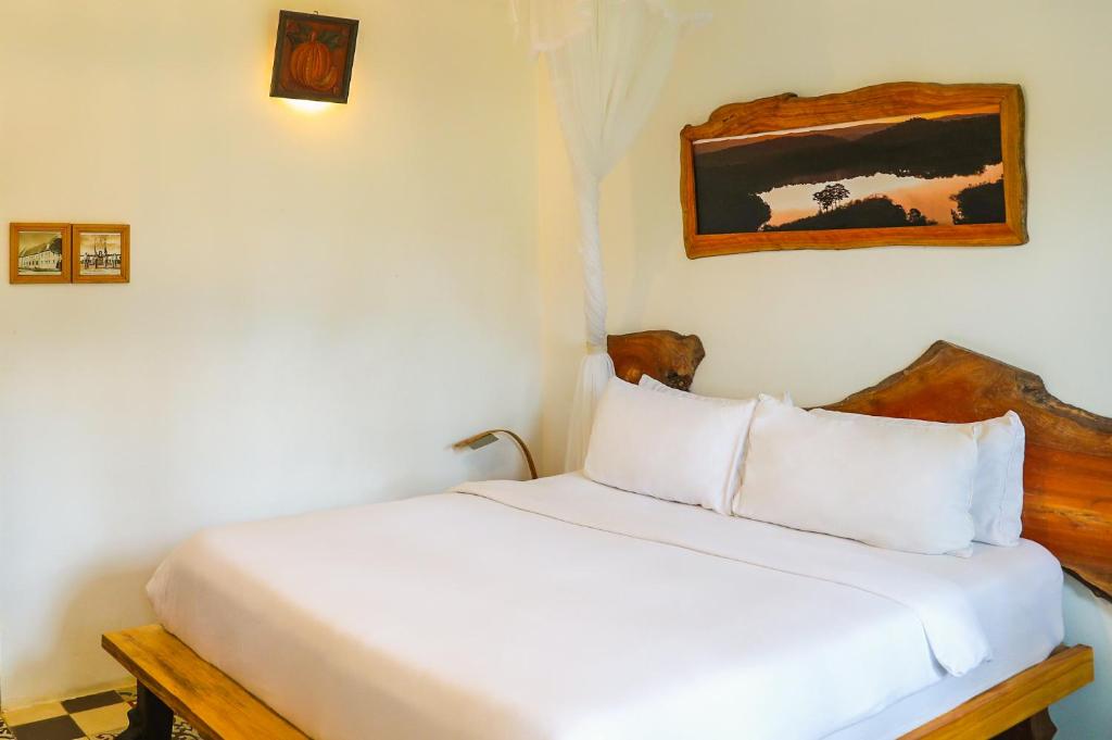 Postel nebo postele na pokoji v ubytování Stop and Go Boutique Hotel