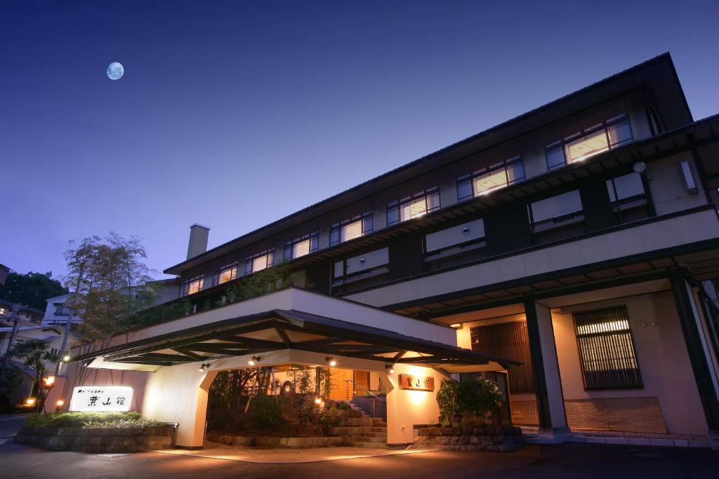 a building with a lit up front of it at Hayamakan in Kaminoyama