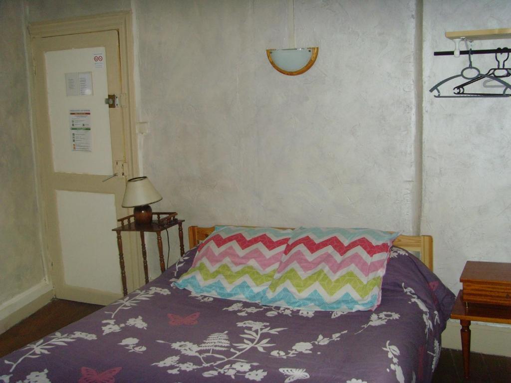 Postel nebo postele na pokoji v ubytování Le Bravard