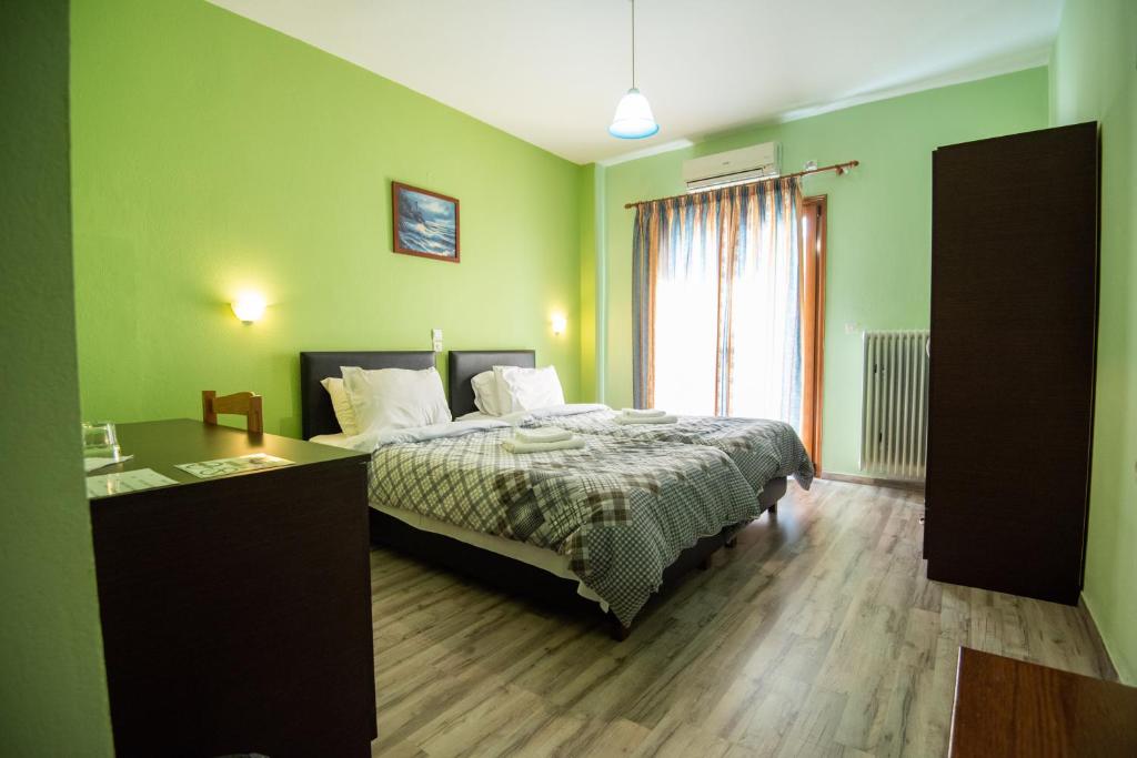 Voodi või voodid majutusasutuse Domus Inn toas