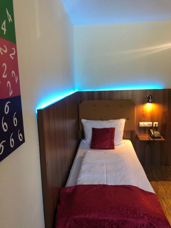 Postel nebo postele na pokoji v ubytování Hotel Post