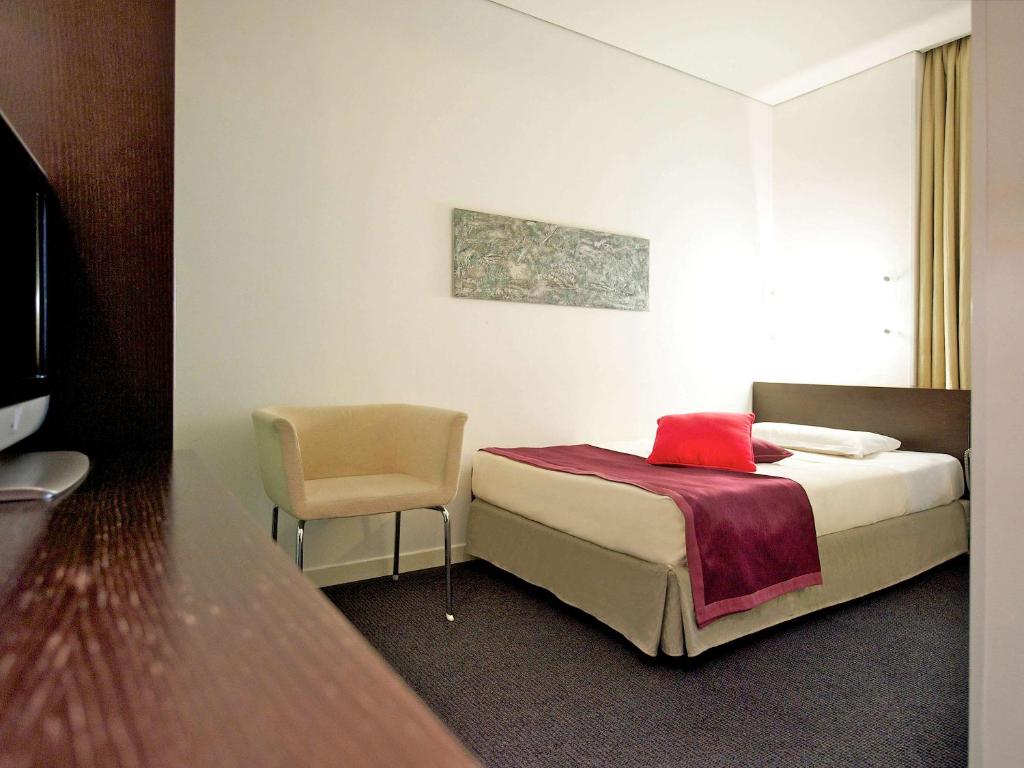 Postel nebo postele na pokoji v ubytování Mercure Palermo Centro