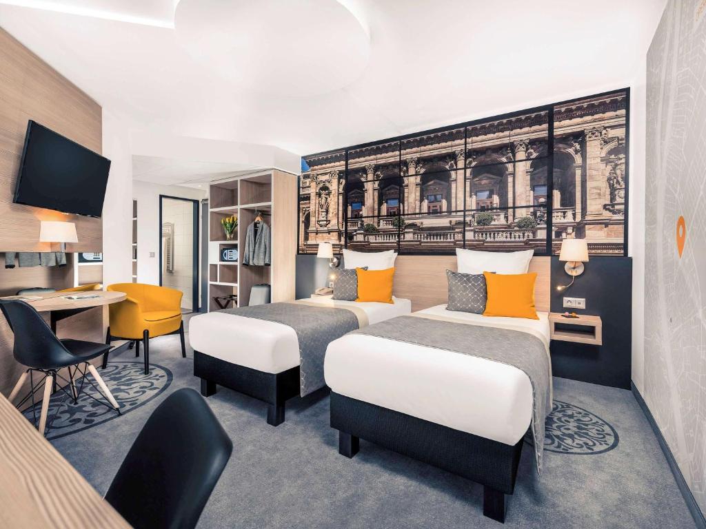 Postel nebo postele na pokoji v ubytování Mercure Budapest City Center