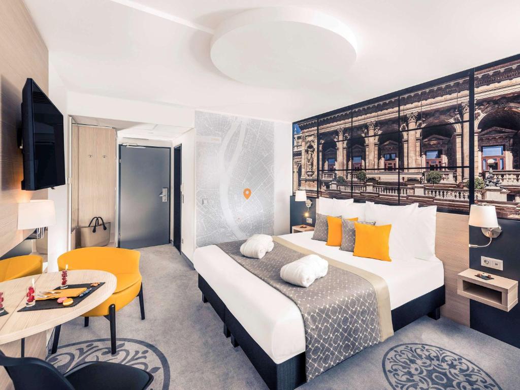 Postel nebo postele na pokoji v ubytování Mercure Budapest City Center