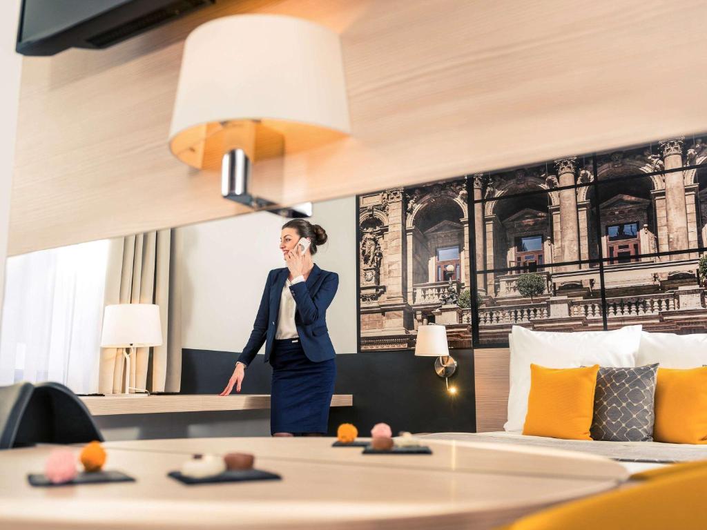 TV a/nebo společenská místnost v ubytování Mercure Budapest City Center