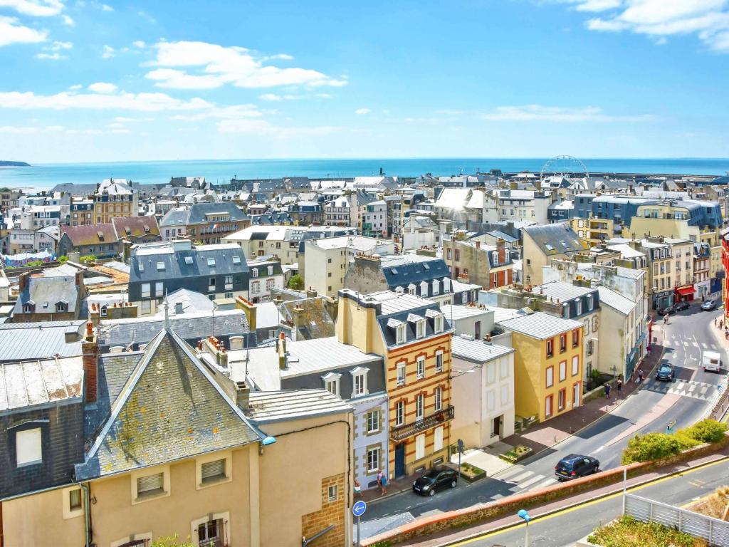 an aerial view of a city with buildings at Mercure Granville Le Grand Large in Granville