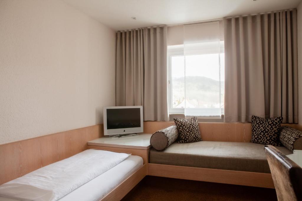Postel nebo postele na pokoji v ubytování Hotel Kolb