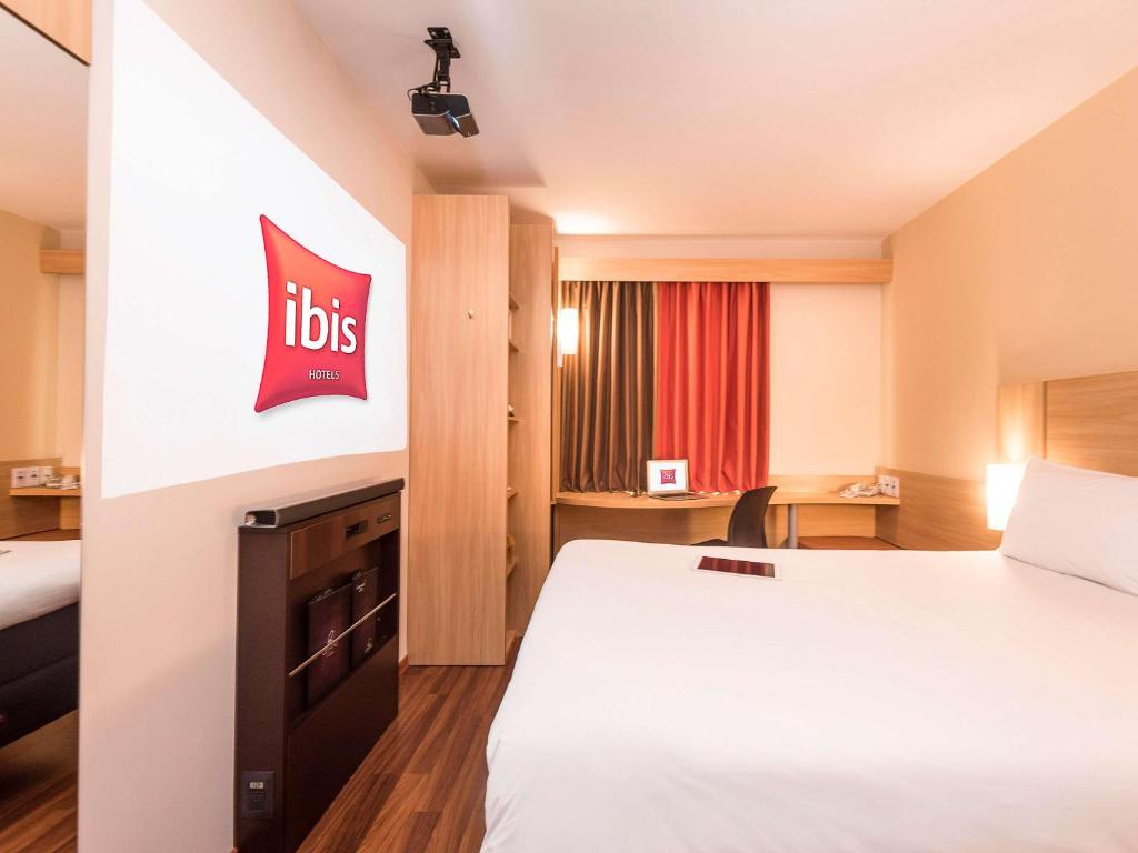 Postel nebo postele na pokoji v ubytování ibis Lima Larco Miraflores