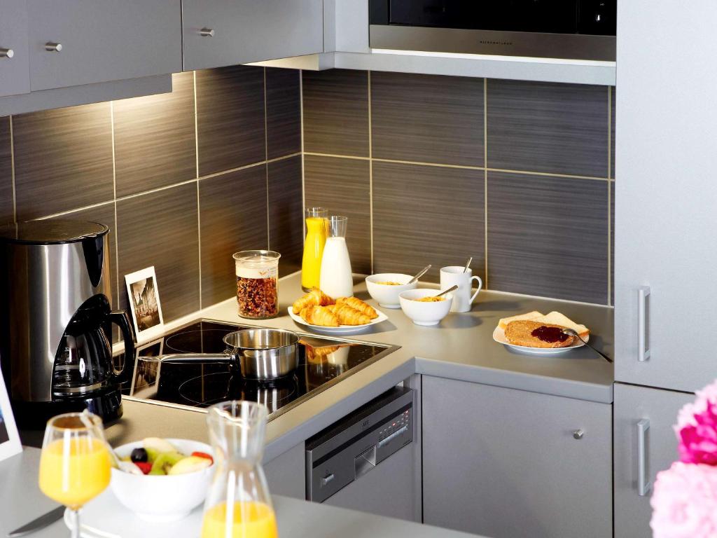 Kuchyň nebo kuchyňský kout v ubytování Aparthotel Adagio Vienna City