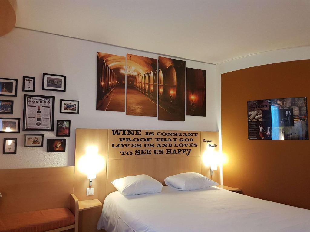 Postel nebo postele na pokoji v ubytování ibis Genève Petit Lancy
