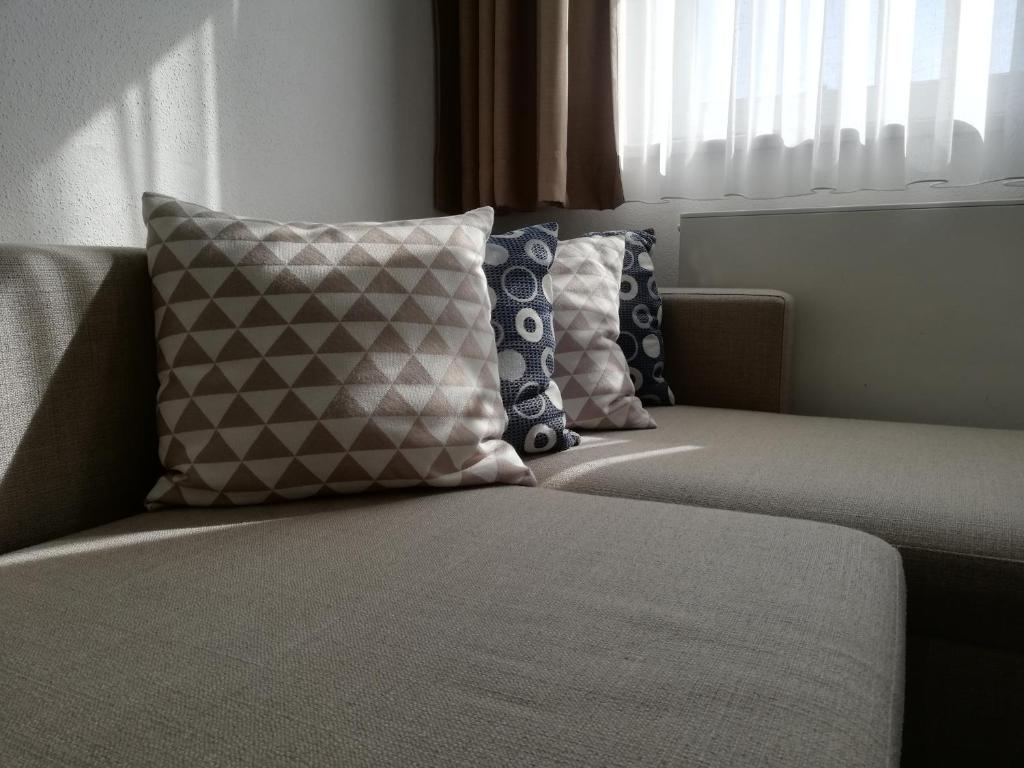 Postel nebo postele na pokoji v ubytování Hotel Nummerhof