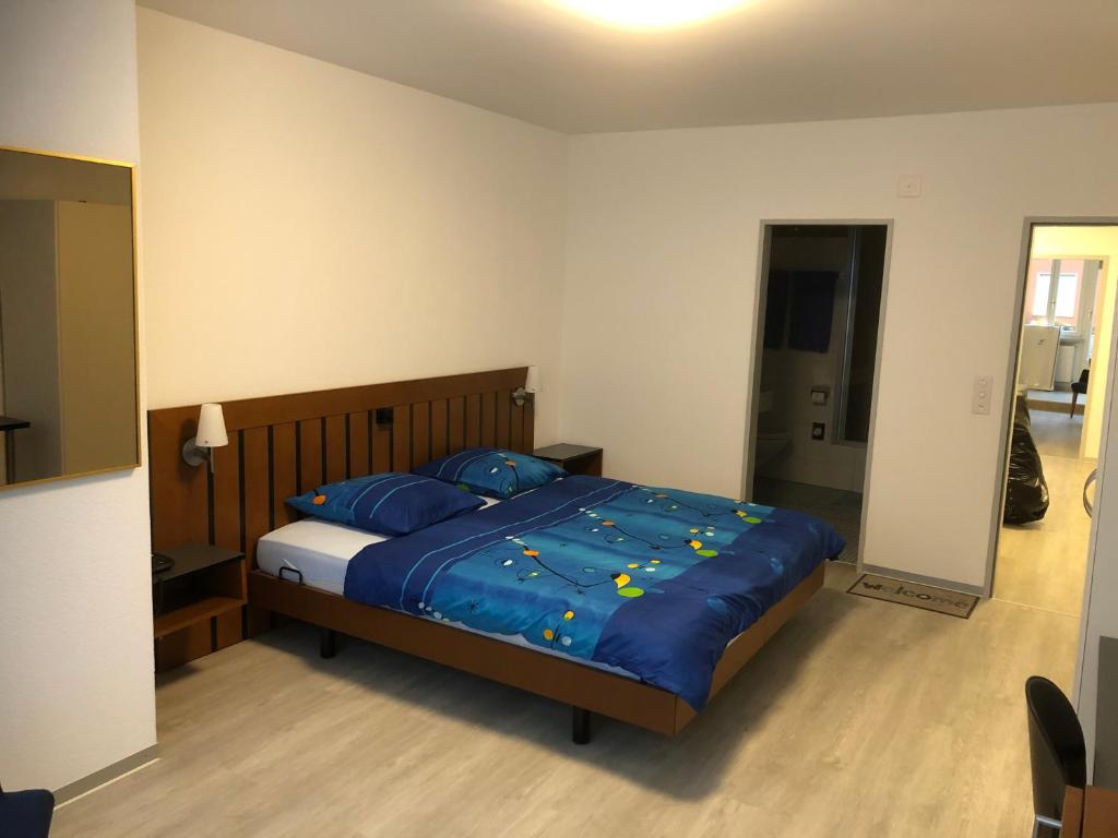 Postel nebo postele na pokoji v ubytování Hotel Restaurant Passage