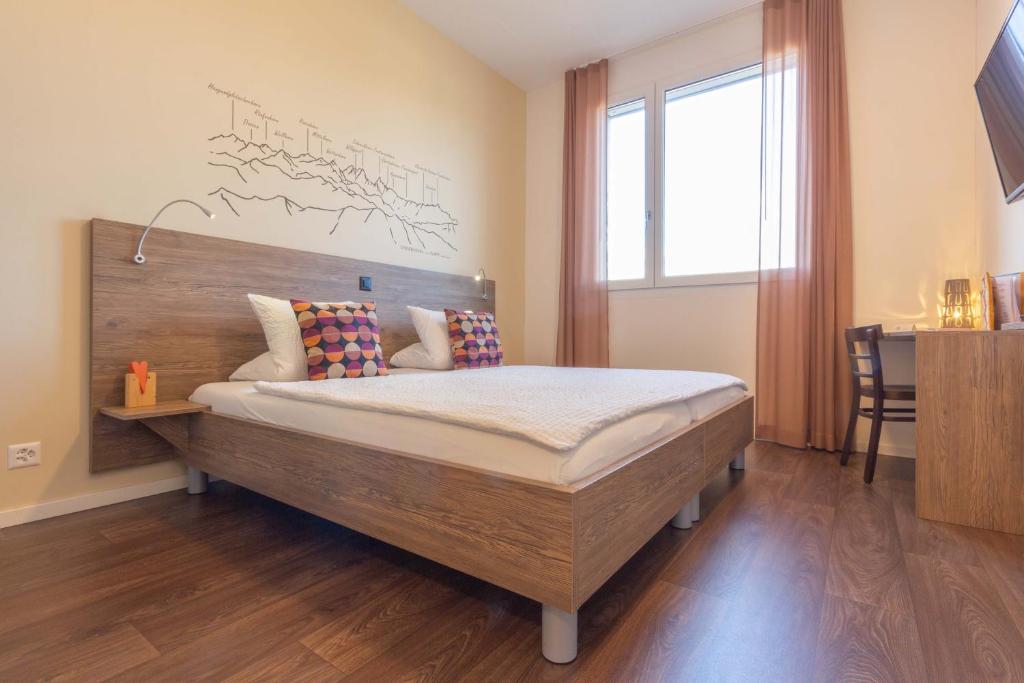 Postel nebo postele na pokoji v ubytování B&B Hotel Peter und Paul