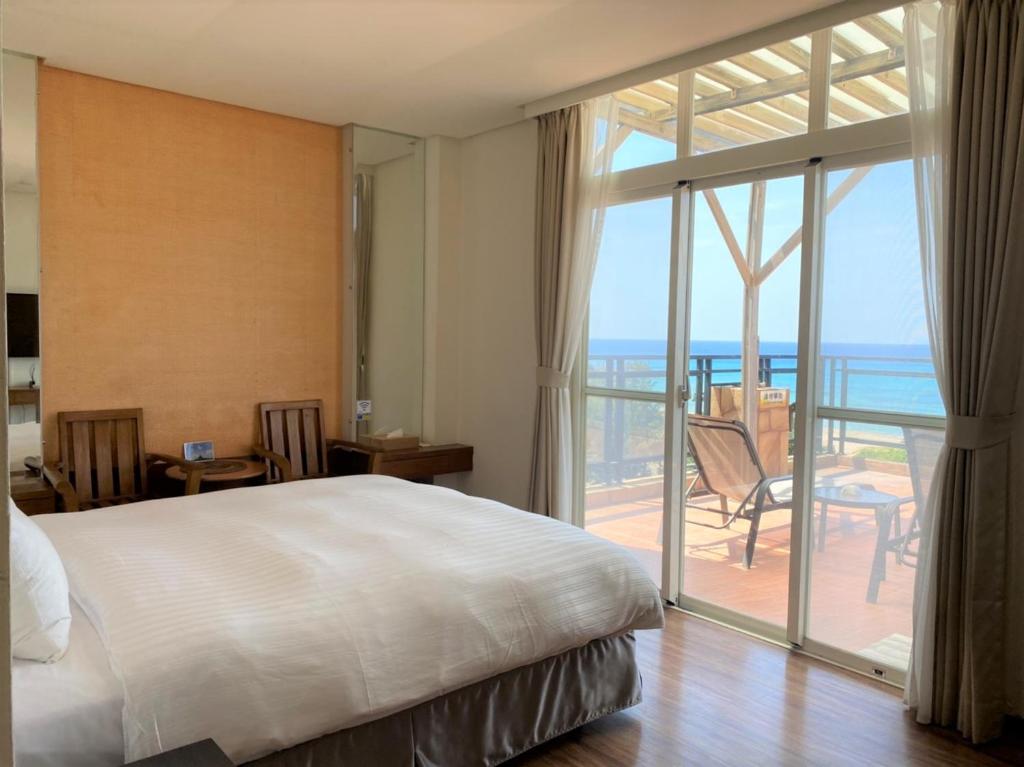 Postel nebo postele na pokoji v ubytování LoveSea 126 Beach Inn