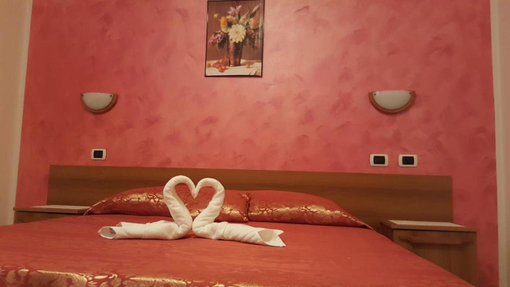 Postel nebo postele na pokoji v ubytování Sogno Sulcitano Masainas