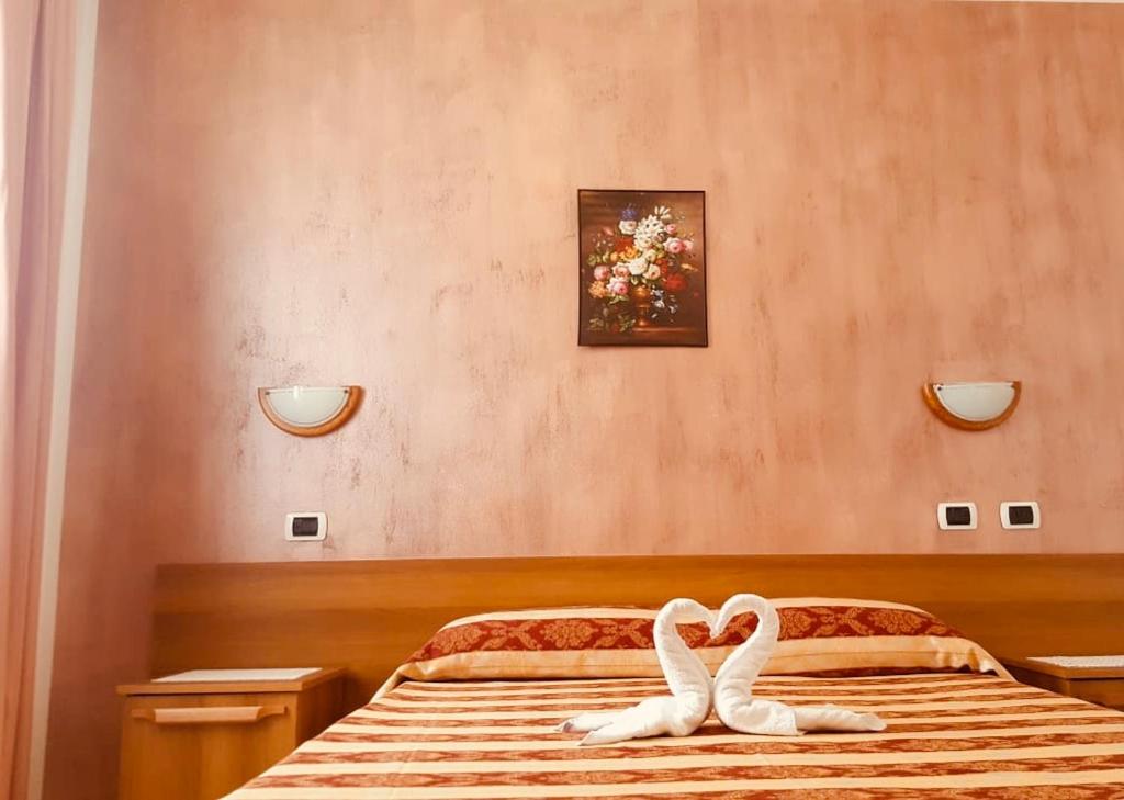 Postel nebo postele na pokoji v ubytování Sogno Sulcitano Masainas