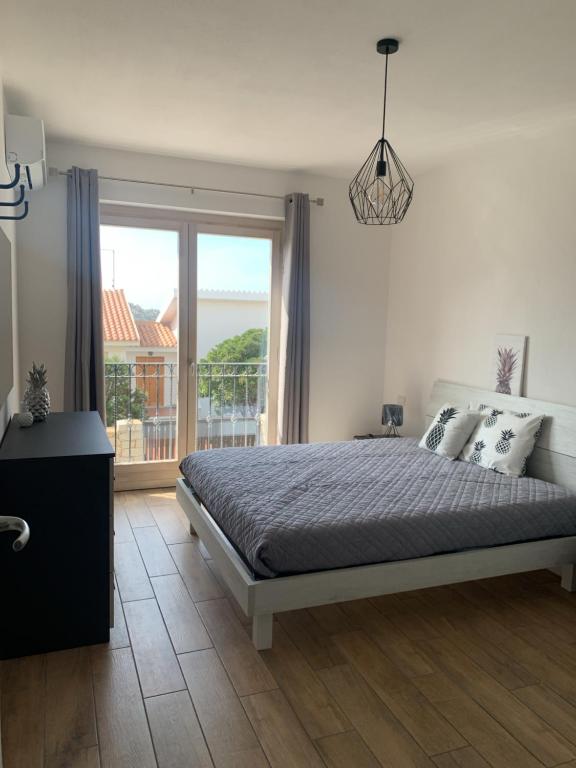 Postel nebo postele na pokoji v ubytování Home La Bufera