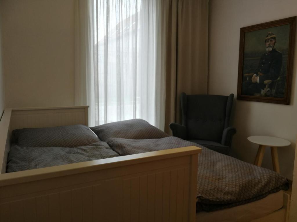 Postel nebo postele na pokoji v ubytování Letní dům Pavlov