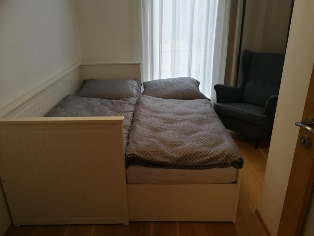 Postel nebo postele na pokoji v ubytování Letní dům Pavlov