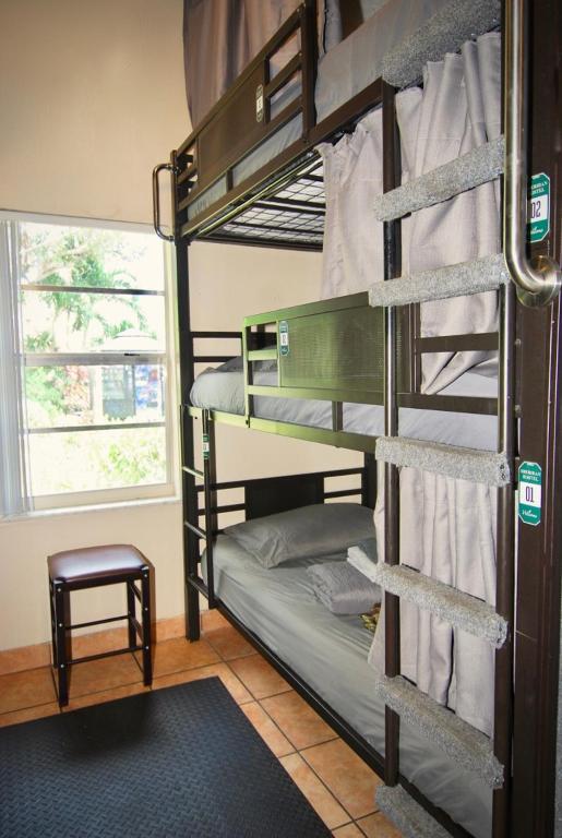 Postel nebo postele na pokoji v ubytování Sheridan Hostel