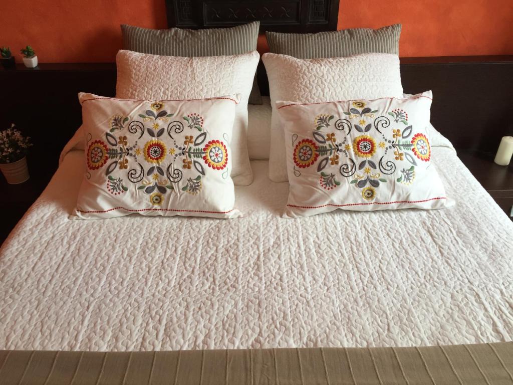 Łóżko lub łóżka w pokoju w obiekcie Hotel Villa San Fedele