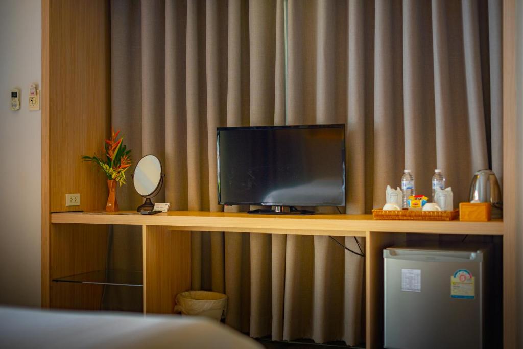 Телевизор и/или развлекательный центр в Siam Bay Resort