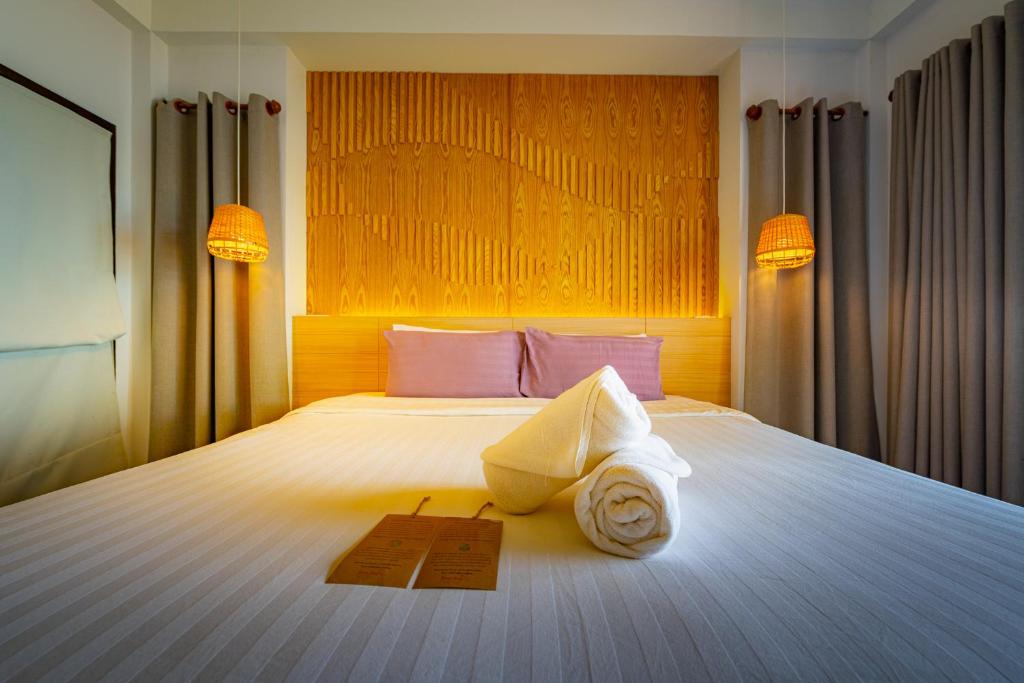 Кровать или кровати в номере Siam Bay Resort