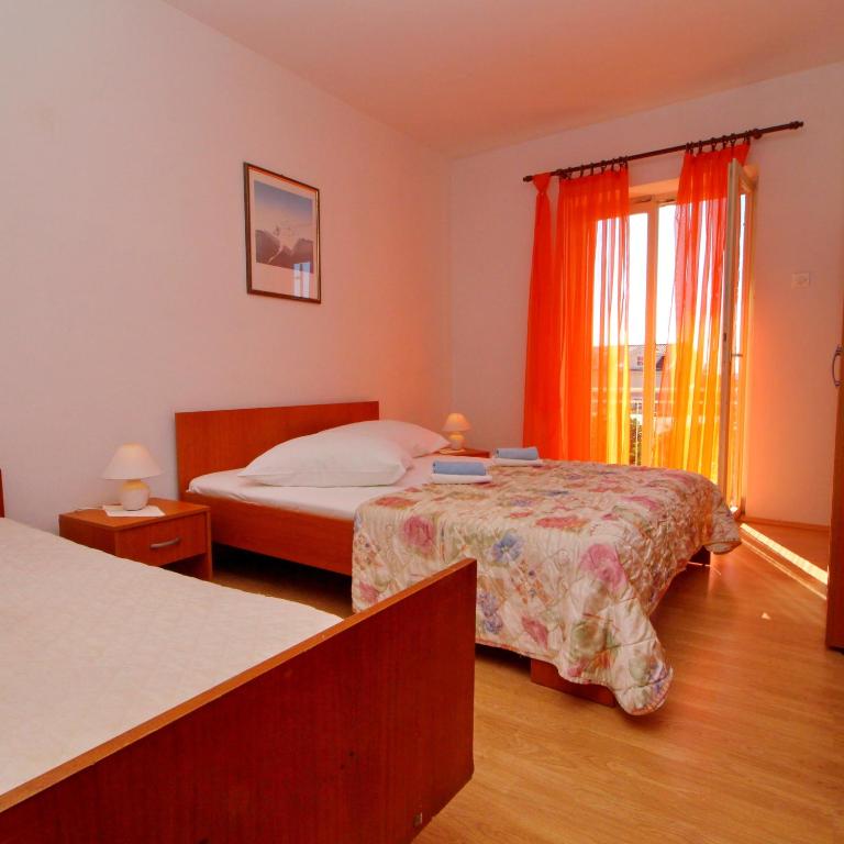 Postel nebo postele na pokoji v ubytování Apartment Domestic