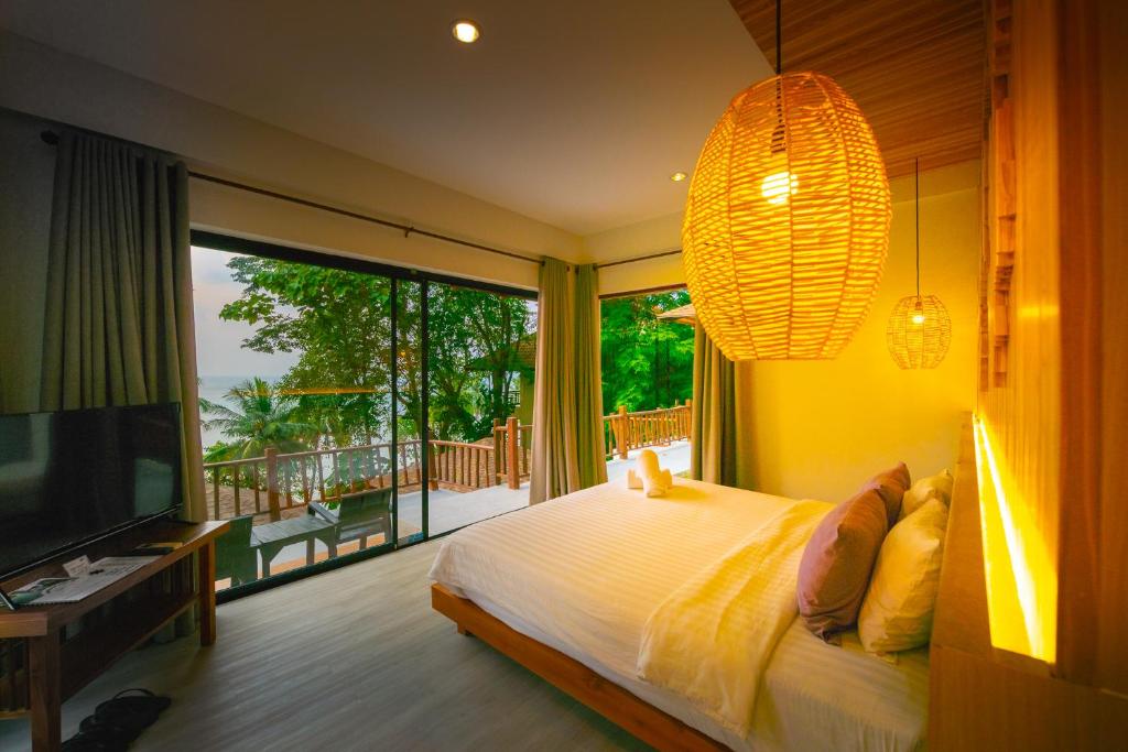 Кровать или кровати в номере Siam Bay Resort